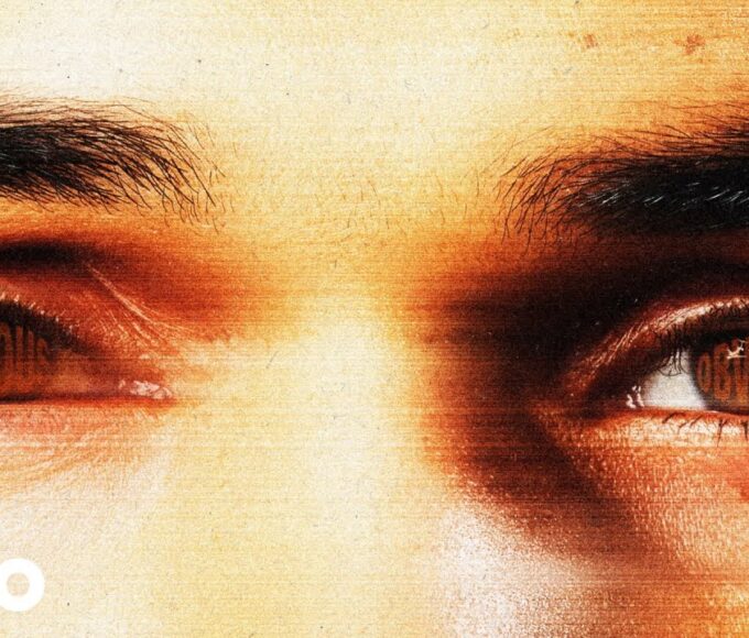 Chris Brown com expressão confiante, vestindo roupa casual, promovendo o novo single "Obvious" lançado a 10 de Abril de 2026.